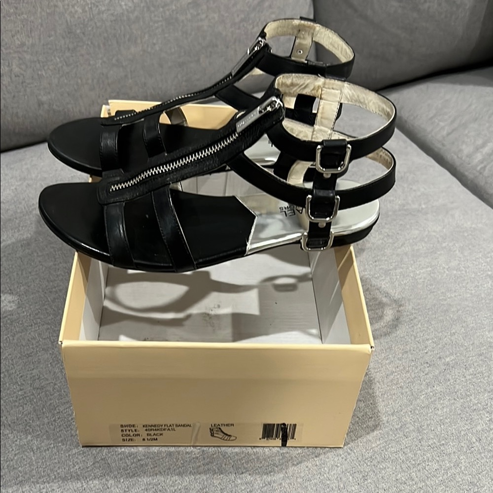 MICHAEL Michael Kors Black Gladiator Sandals with Metallic Buckles